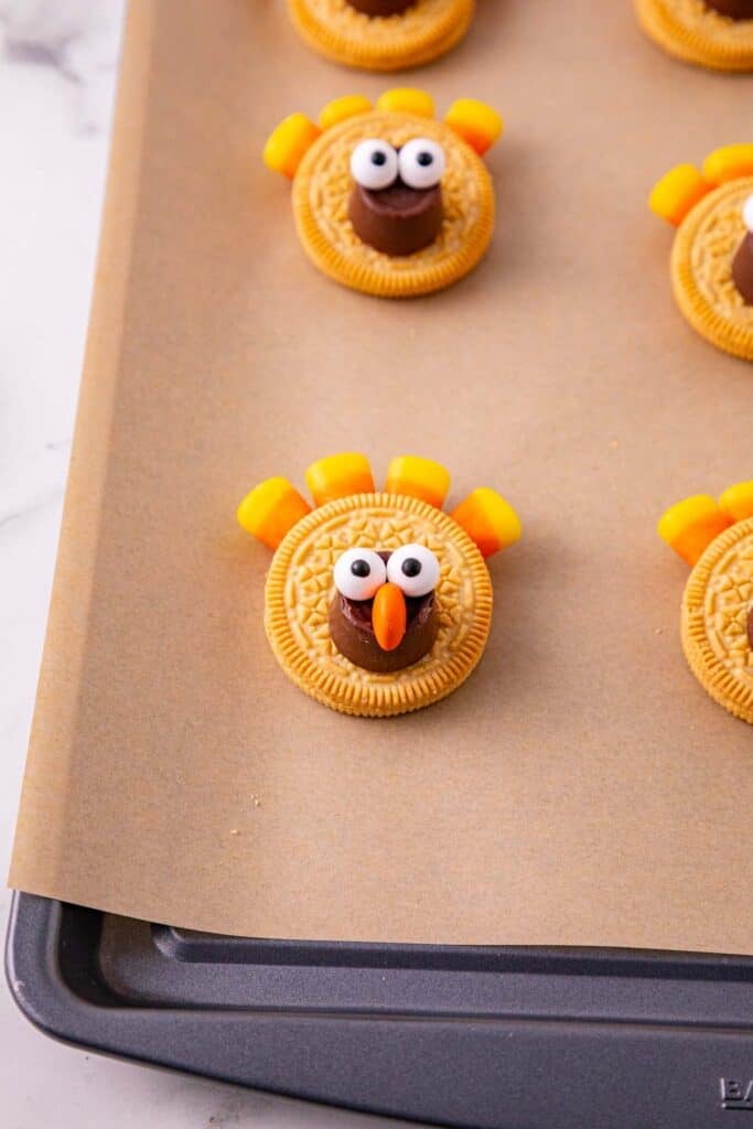 reese's pieces half used as a nose for a turkey cookie
