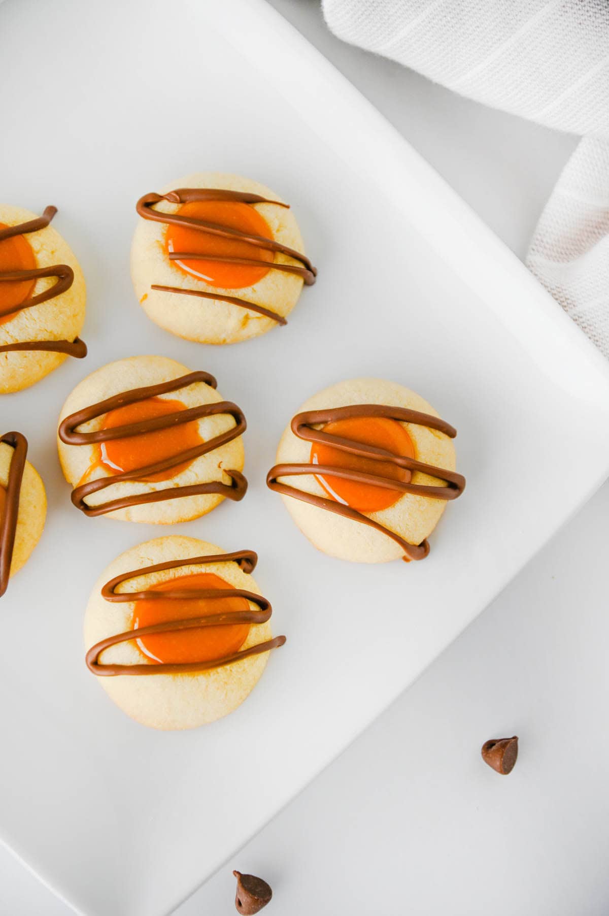twix thumbprint cookies on a plate