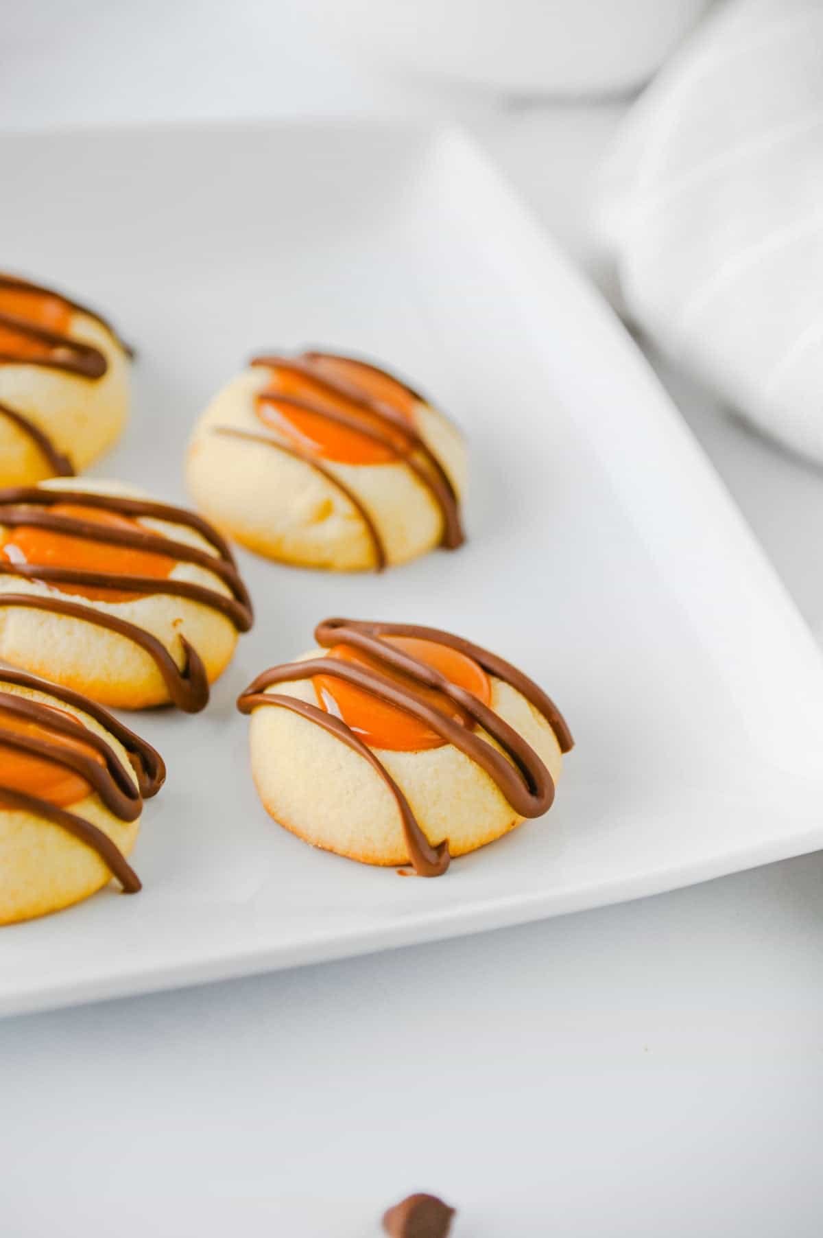 caramel thumbprint cookies on a plate