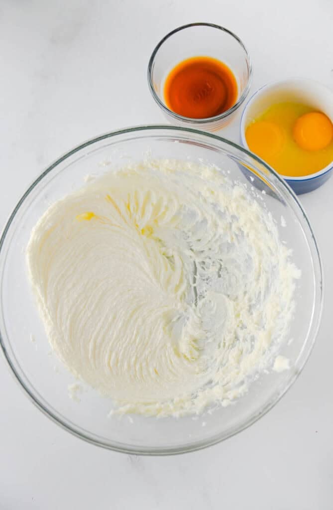 whipped butter and sugar mixture in a glass bowl