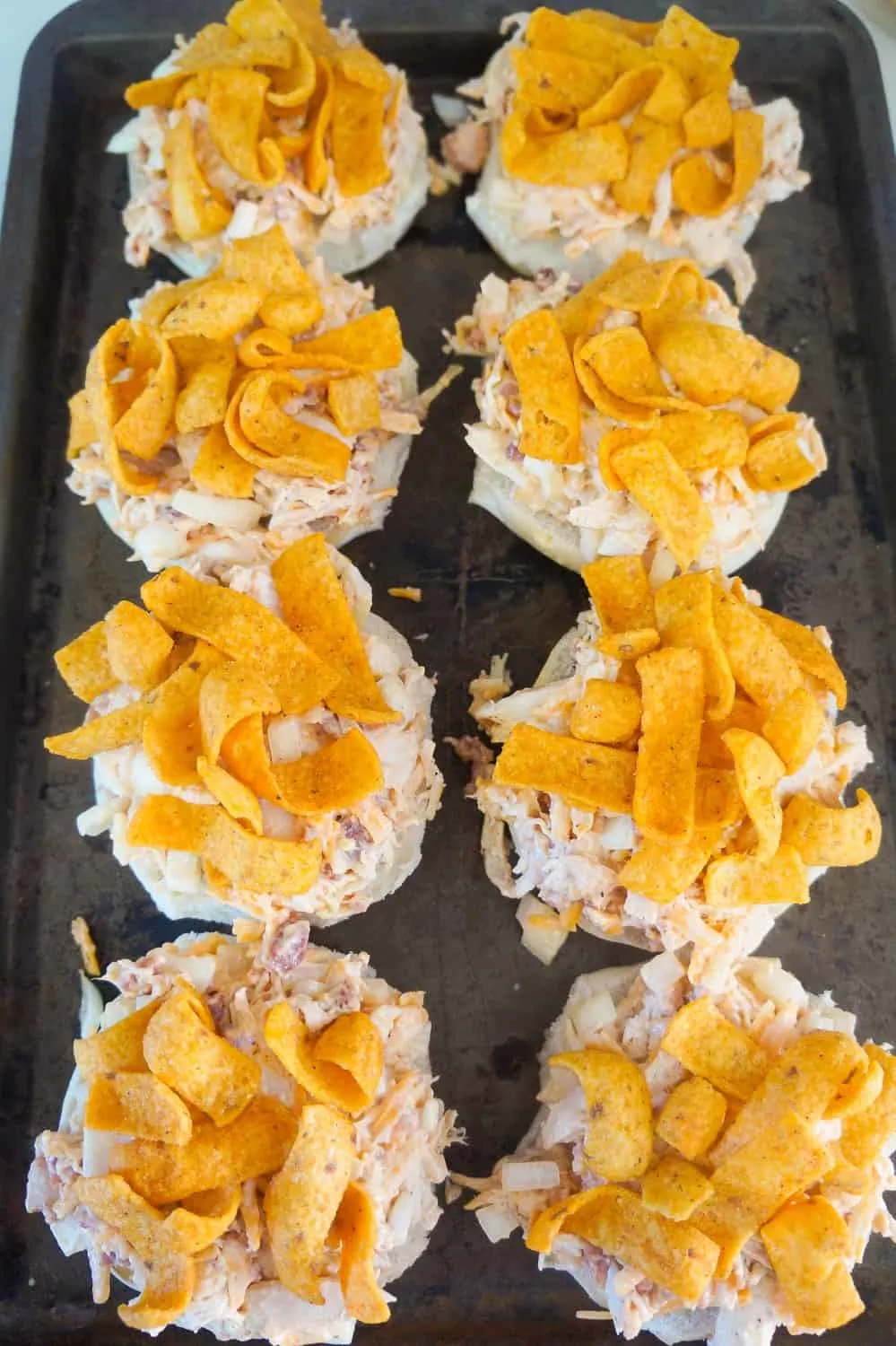 BBQ Fritos on top of chicken salad sandwiches