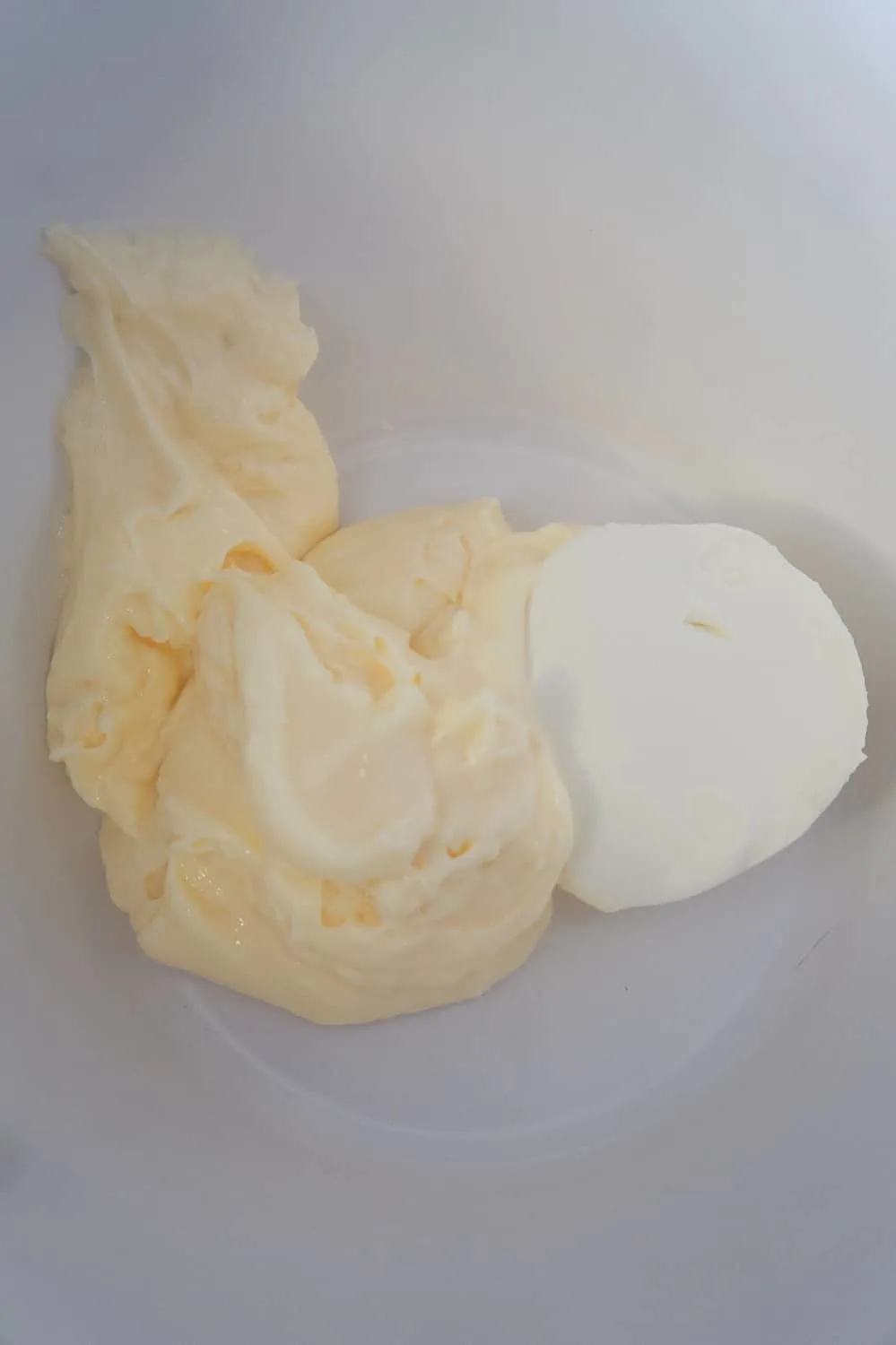 mayo and cream cheese in a mixing bowl