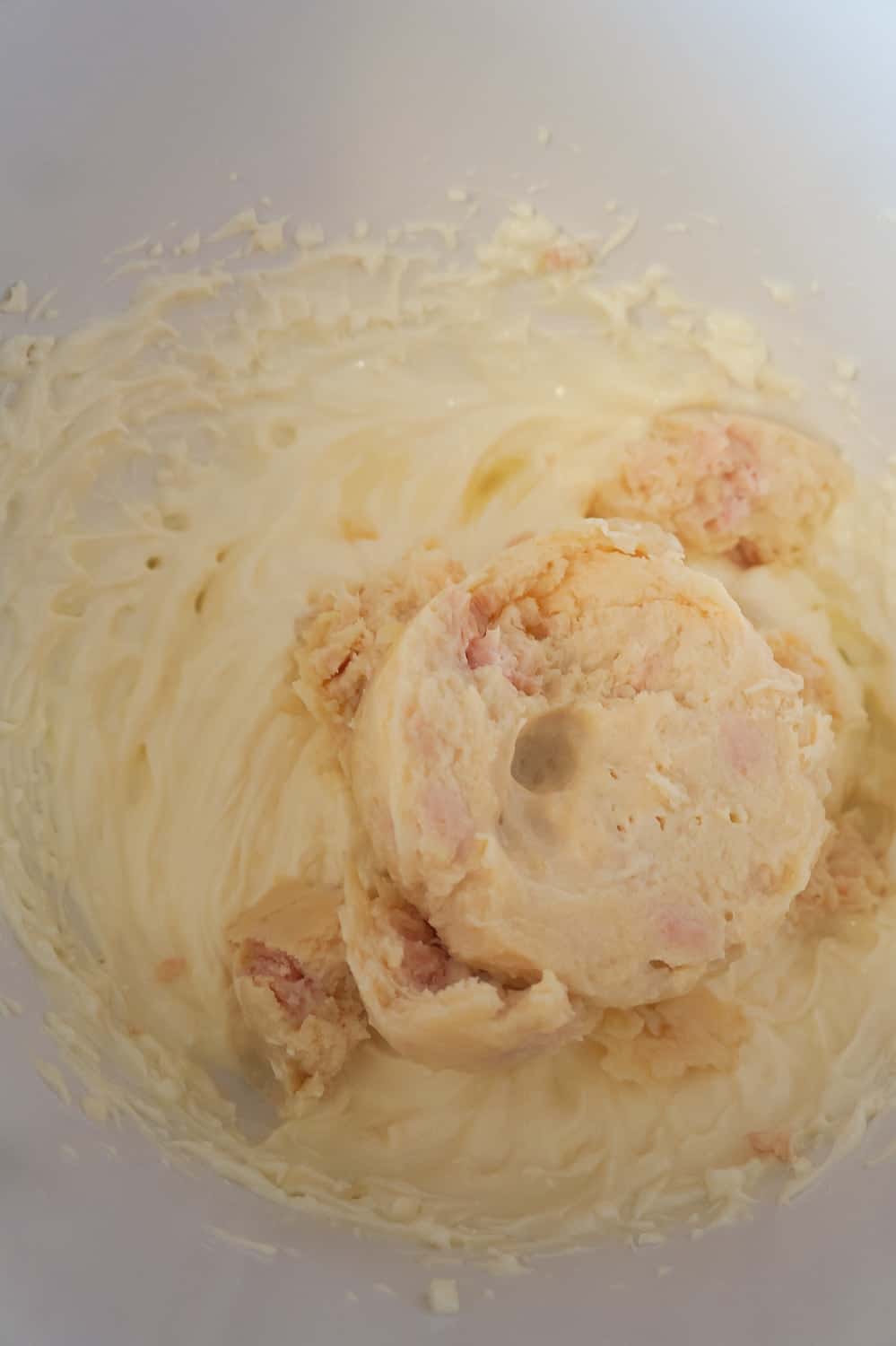 canned chicken in a bowl with mayo and cream cheese