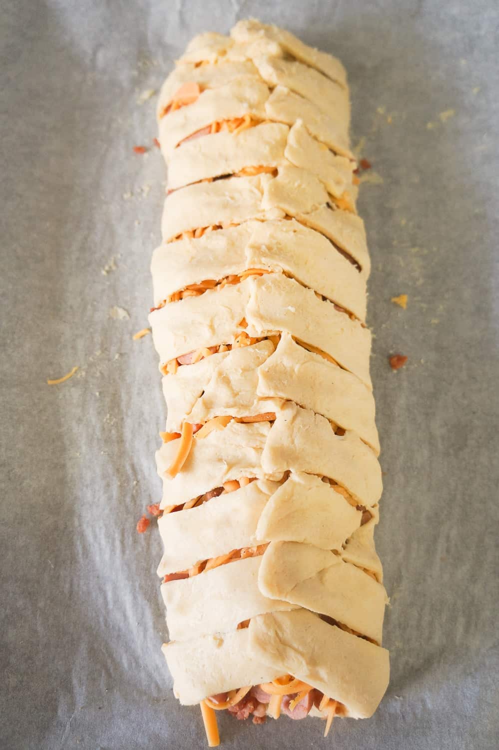 bacon cheese dog crescent braid before baking