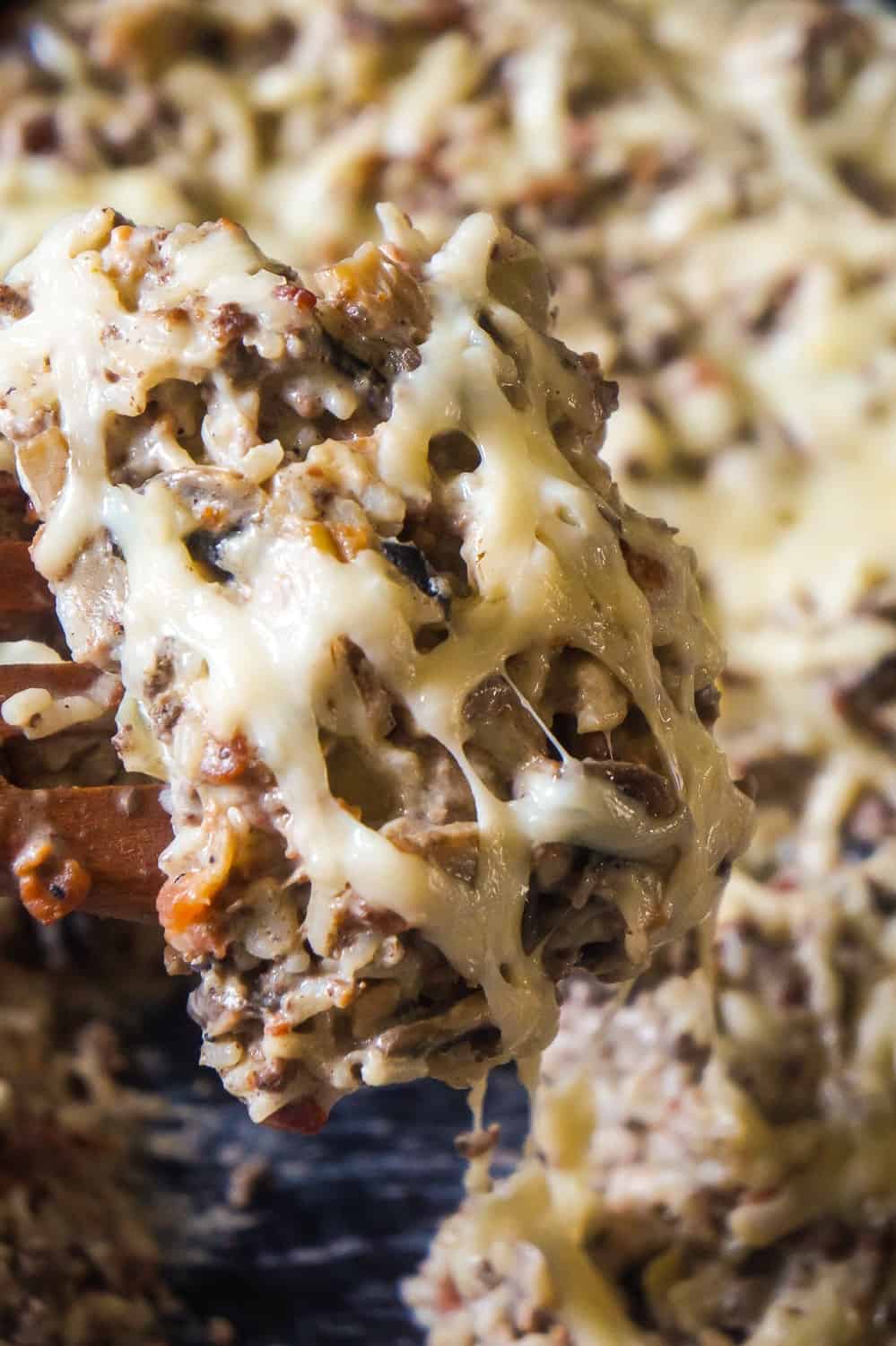 Bacon Mushroom Swiss Ground Beef and Rice is an easy stove top dinner recipe that can be on the table in under 30 minutes. This ground beef dish is loaded with sliced mushrooms, real bacon bits and Swiss cheese.