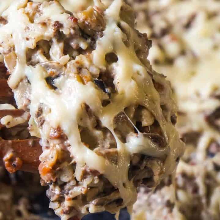 Bacon Mushroom Swiss Ground Beef and Rice is an easy stove top dinner recipe that can be on the table in under 30 minutes. This ground beef dish is loaded with sliced mushrooms, real bacon bits and Swiss cheese.