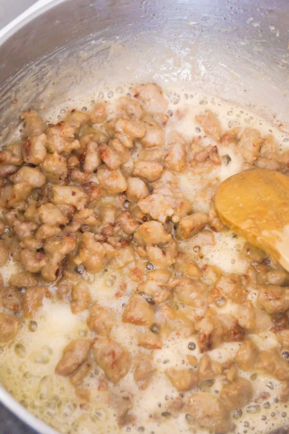 browned breakfast sausage meat with flour and butter