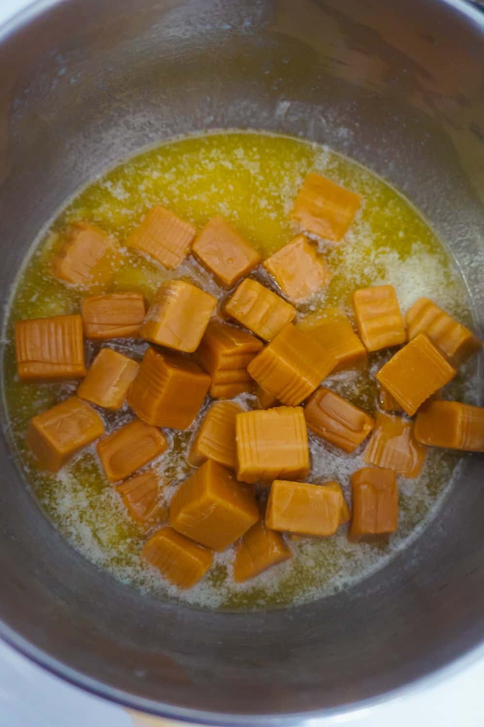 caramels and melted butter in a saucepan