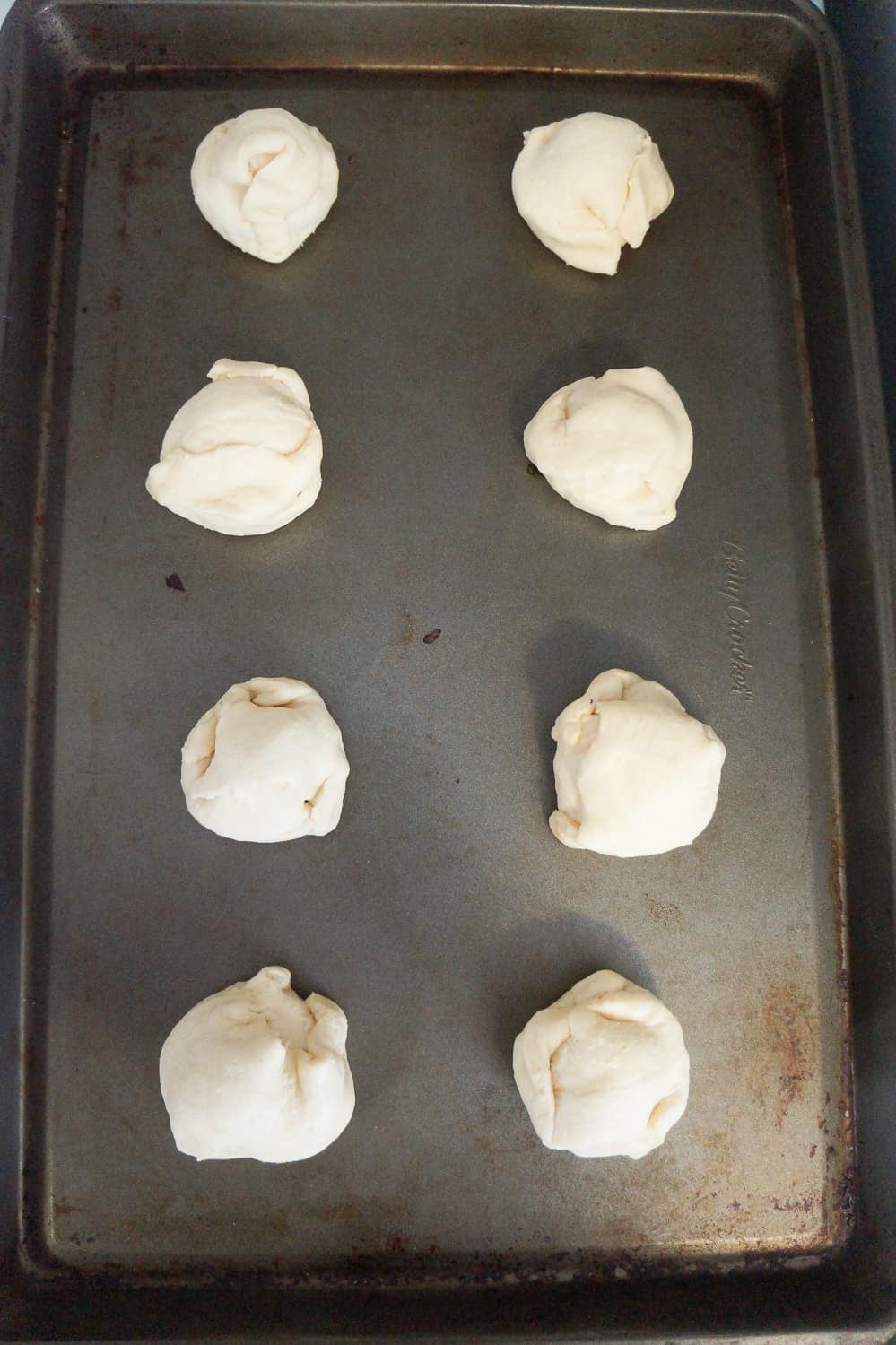 caramel peanut butter cup stuffed crescent rolls before baking