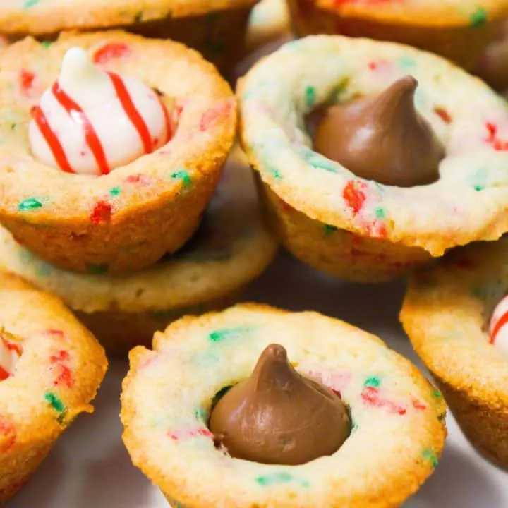 Mini sugar cookie cups filled with Hershey's Kisses.