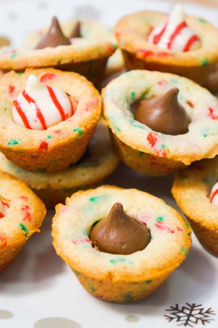 Mini sugar cookie cups filled with Hershey's Kisses.