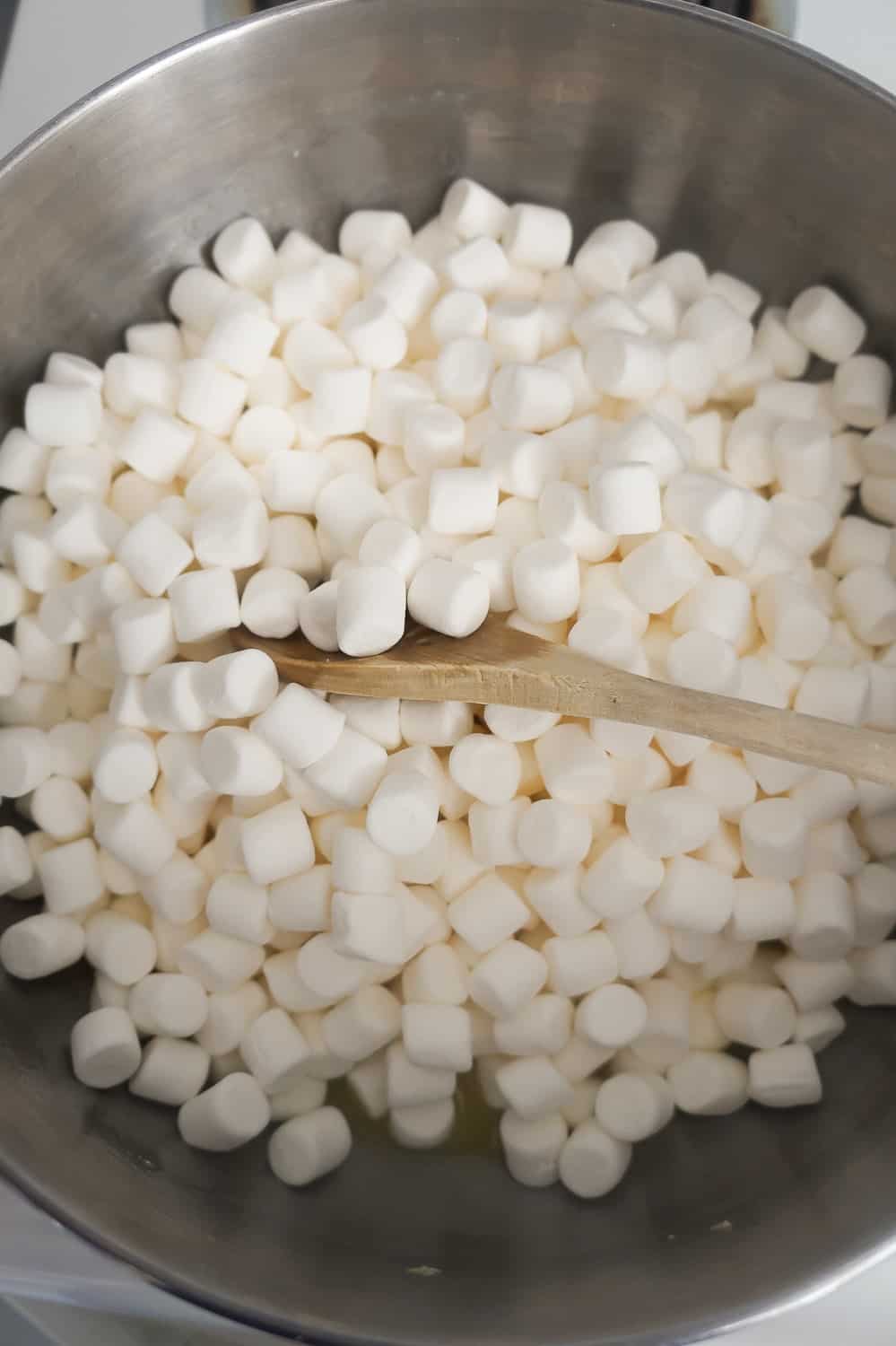 mini marshmallows in a saucepan with melted butter
