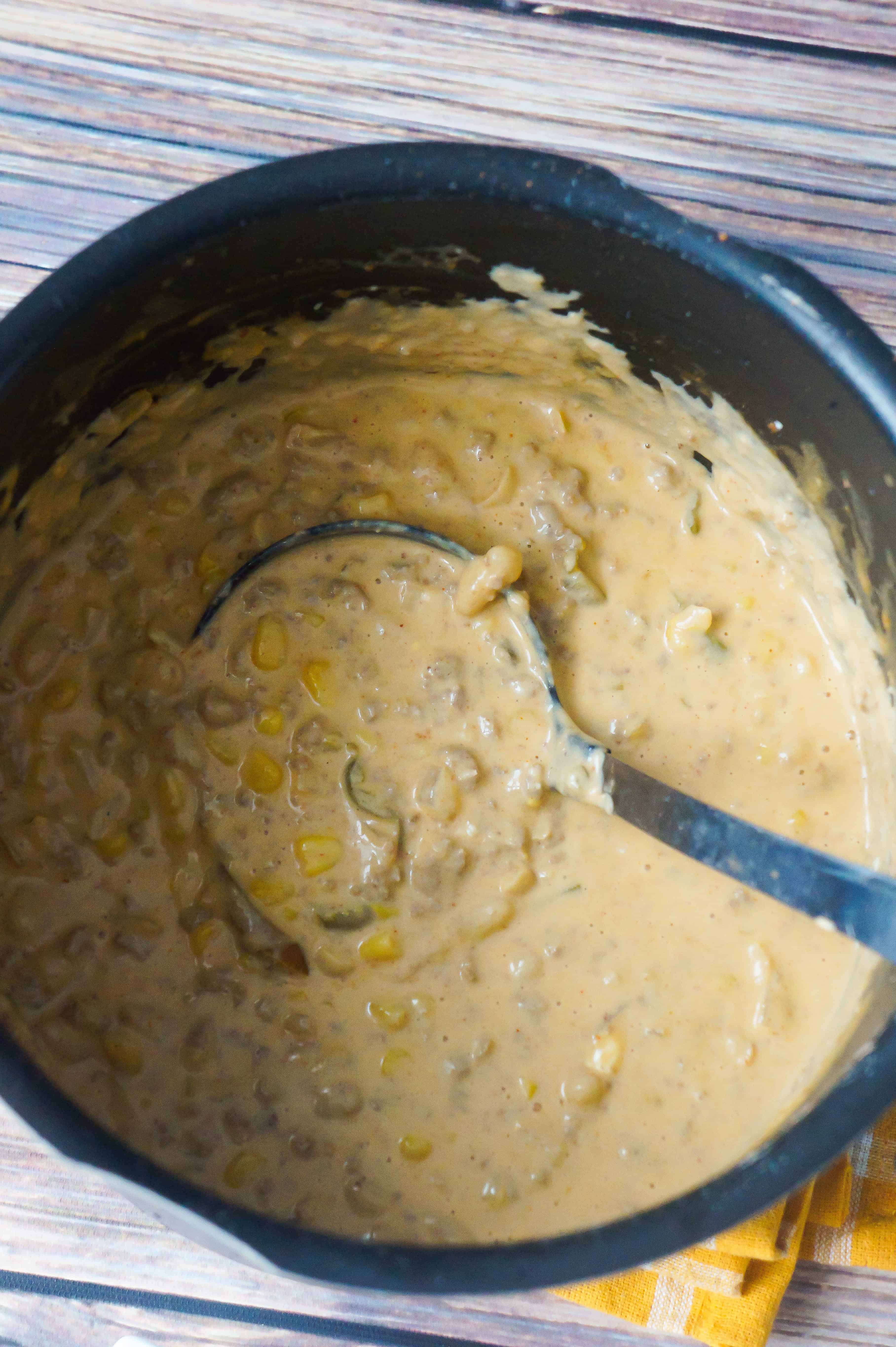 Pot of creamy ground chicken chili.