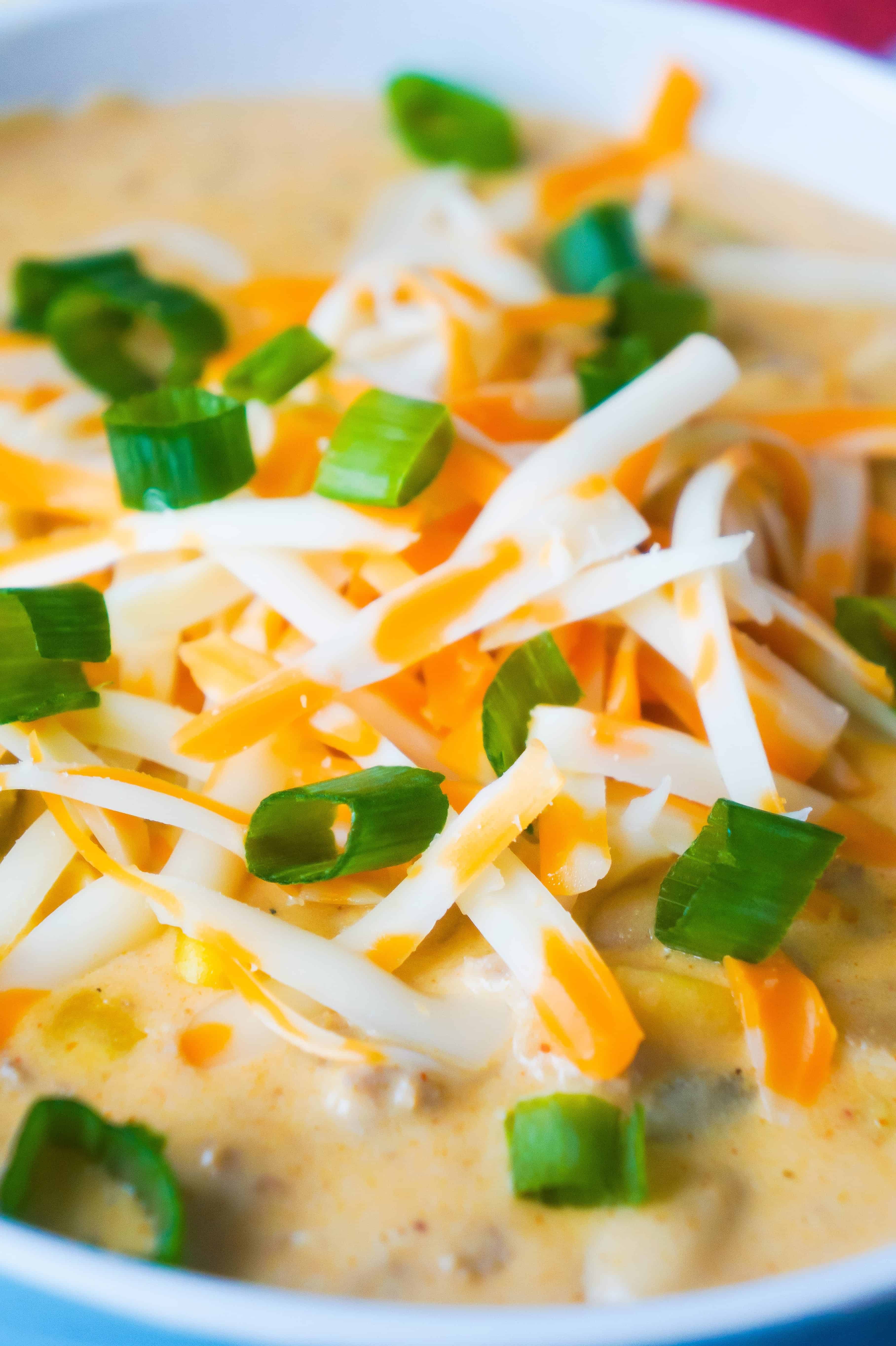White Chicken Chili loaded with cheddar cheese.