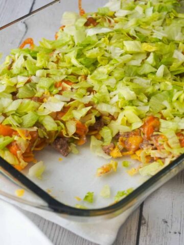 Big Mac Frito Pie is an easy ground beef dinner recipe that can be on the table in under 30 minutes. Frito's corn chips are topped with ground beef mixed with Big Mac sauce, diced pickles and cheddar cheese.