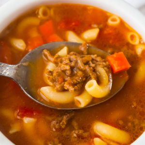 Easy Hamburger Soup with Macaroni is a hearty soup recipe that takes just fifteen minutes from start to finish.This delicious soup is loaded with ground beef, diced tomatoes, mixed vegetables and macaroni noodles.