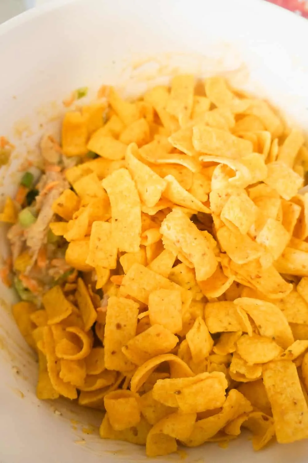fritos and casserole filling in bowl