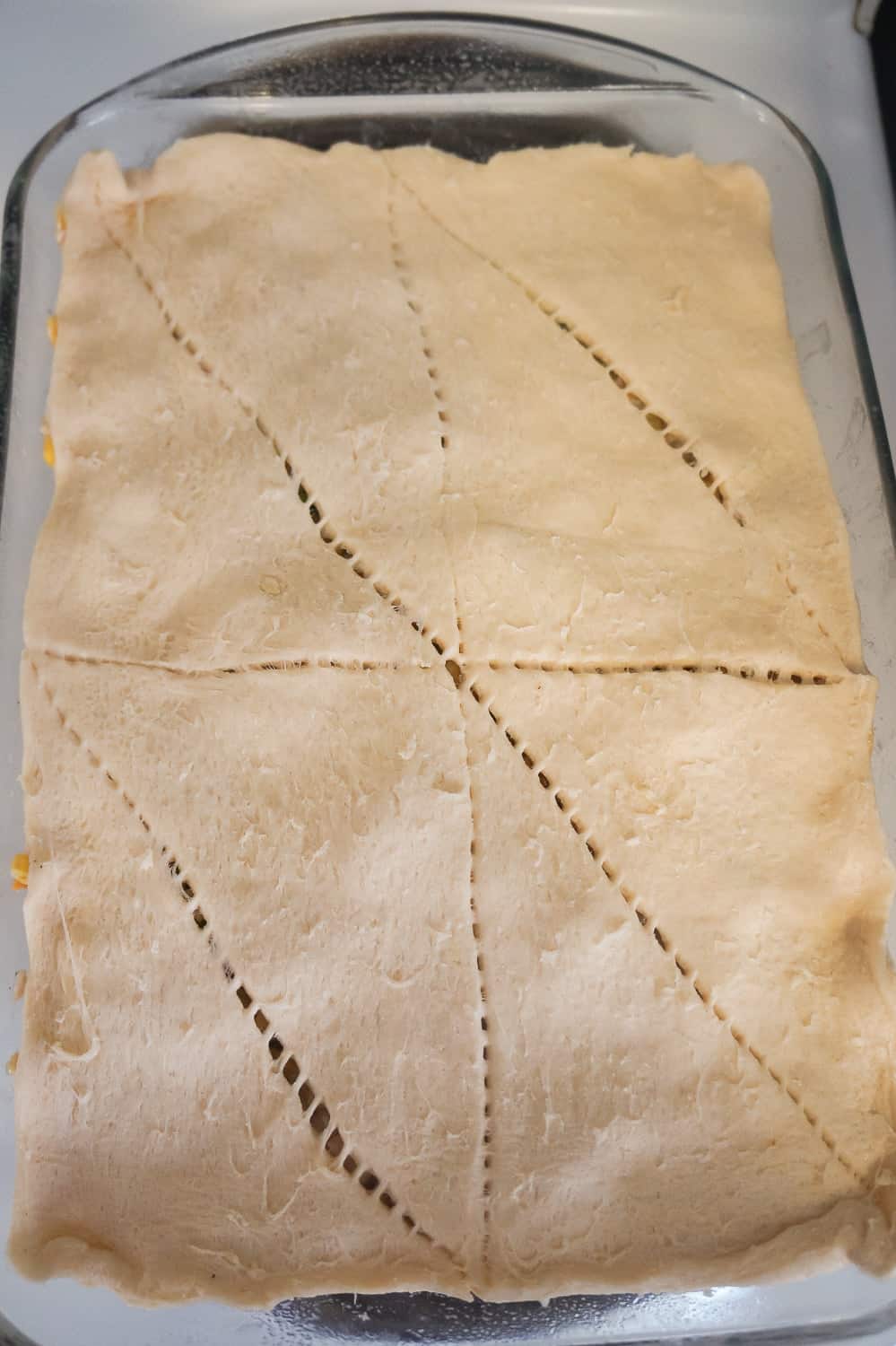 crescent roll dough on top of chicken casserole