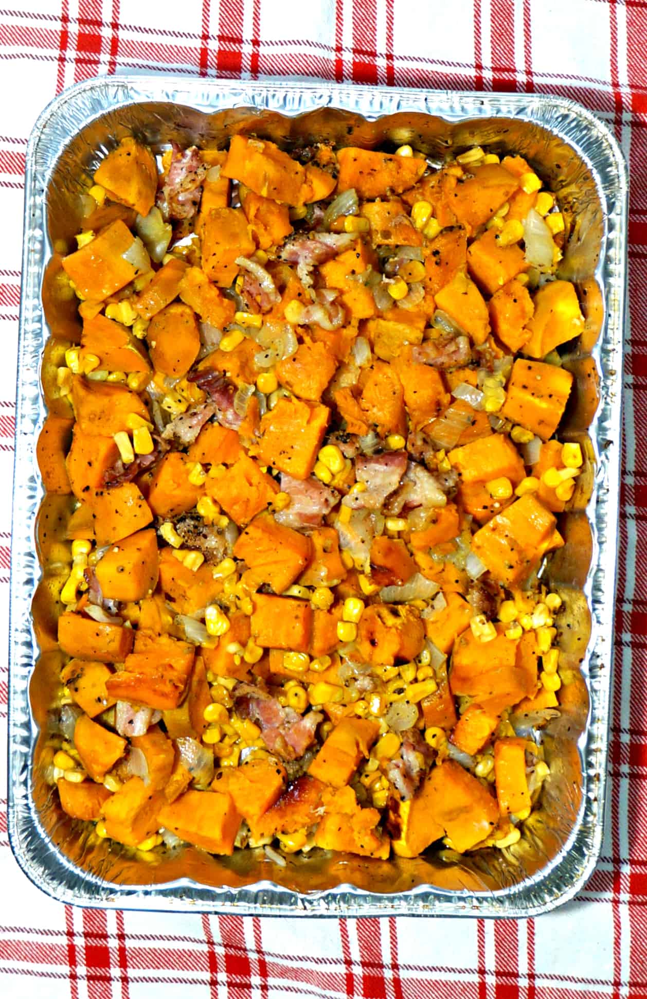 Grilled Sweet Potatoes with Bacon, Onions and Corn. BBQ side dish. Grilled veggies.