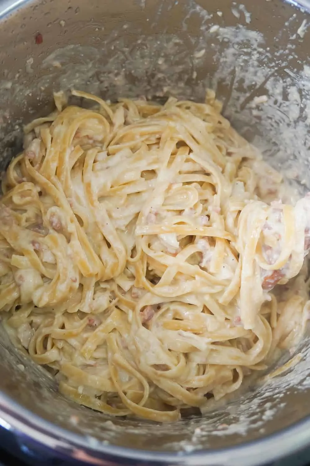 Chicken and bacon fettuccine Alfredo in an Instant Pot.