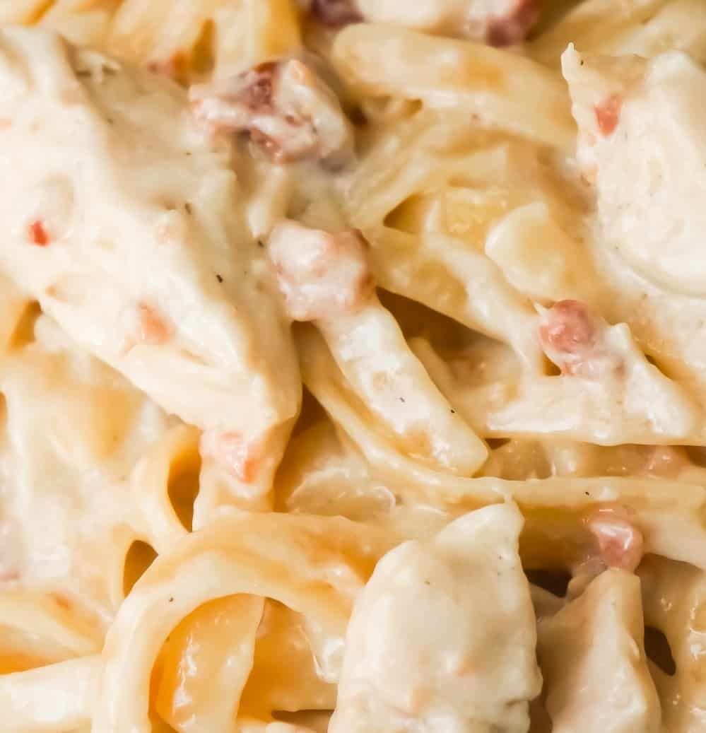 Instant Pot Bacon & Chicken Fettuccine Alfredo is an easy dinner recipe using an Instant Pot. This delicious pasta is coated in a creamy garlic Alfredo sauce and loaded with chicken and bacon.