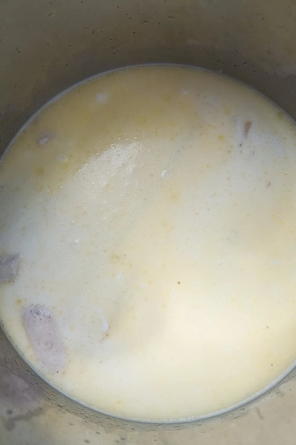 chicken broth and cream in an Instant Pot