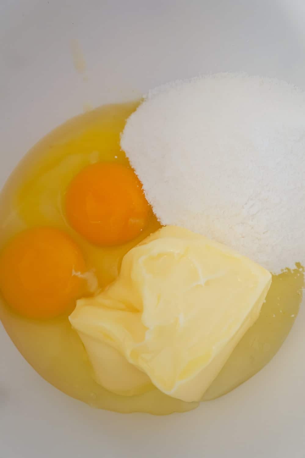 eggs, softened butter and lemon pudding mix in a mixing bowl