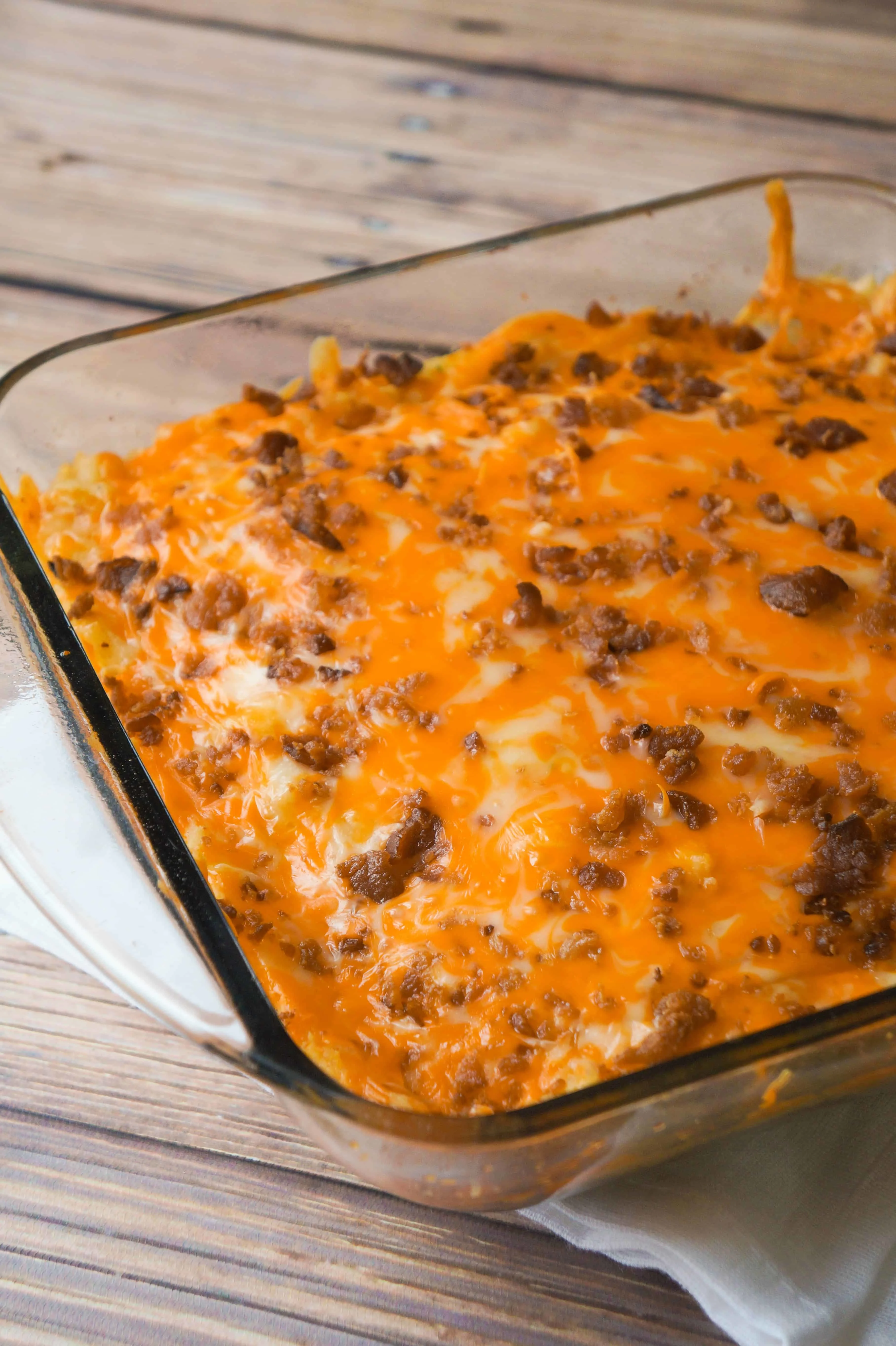 Loaded Potato Meatloaf Casserole. Ground beef meatloaf topped with garlicky instant mashed potatoes, cheese and bacon. Easy dinner recipe.