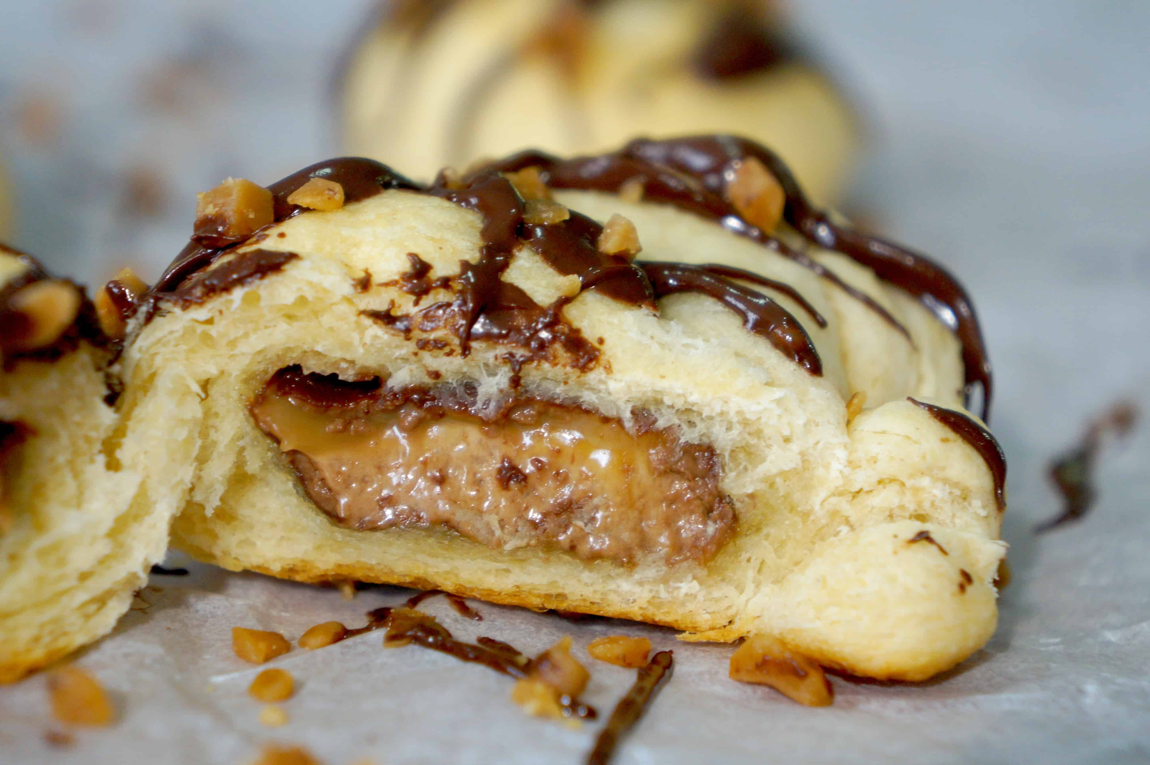 Mars Bar Stuffed Crescent Rolls. Easy dessert recipe using Pillsbury crescent rolls and snack sized Mars bars.