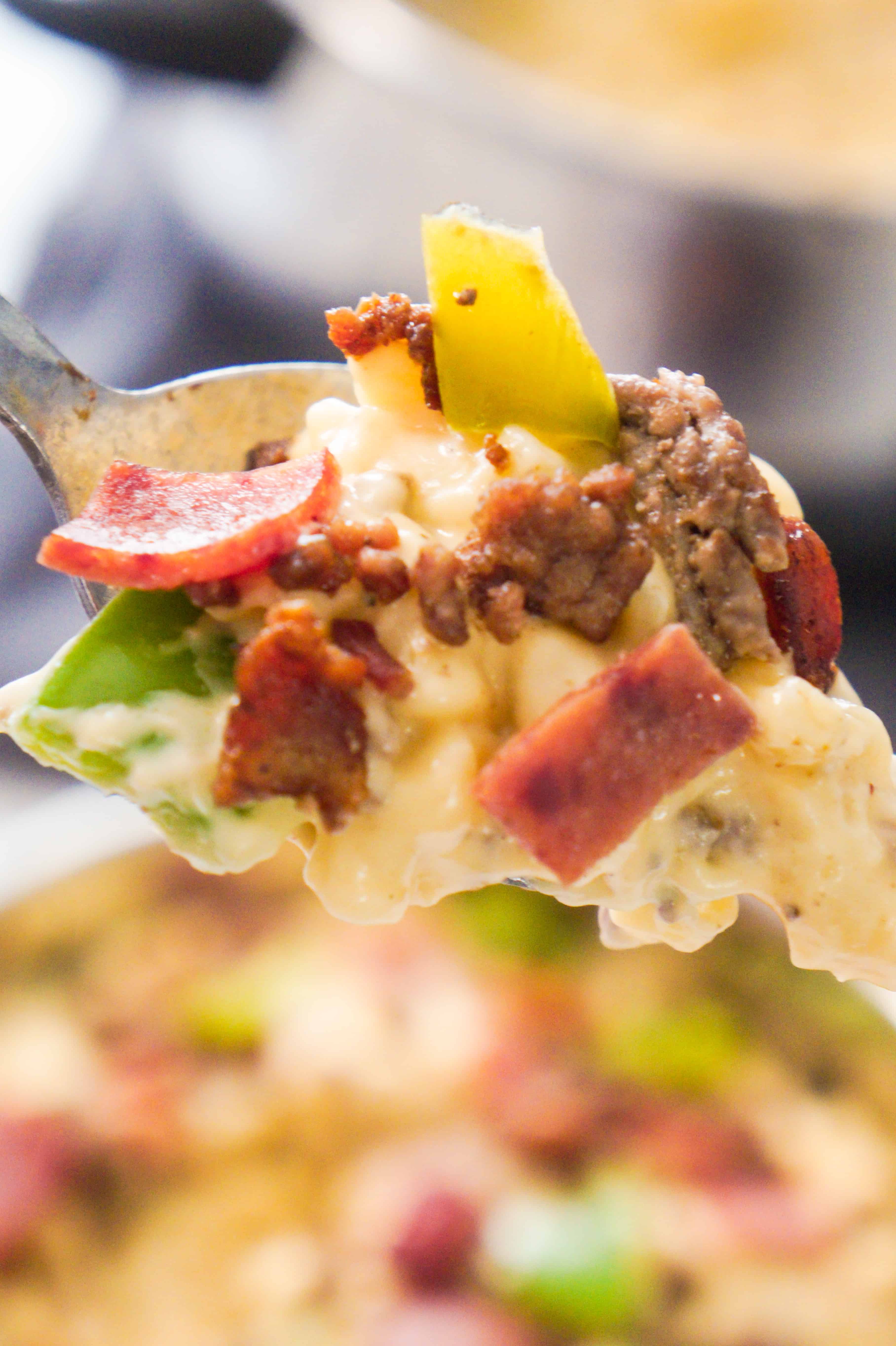 Meat Lover's Mac and Cheese. Easy homemade macaroni and cheese recipe loaded with ground beef, bacon, pepperoni and green peppers. Easy pasta dinner recipe. 