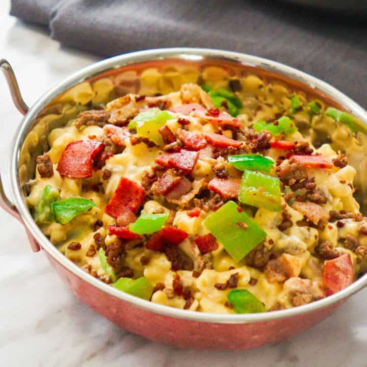 Meat Lover's Mac and Cheese. Easy homemade macaroni and cheese recipe loaded with ground beef, bacon, pepperoni and green peppers. Easy pasta dinner recipe.