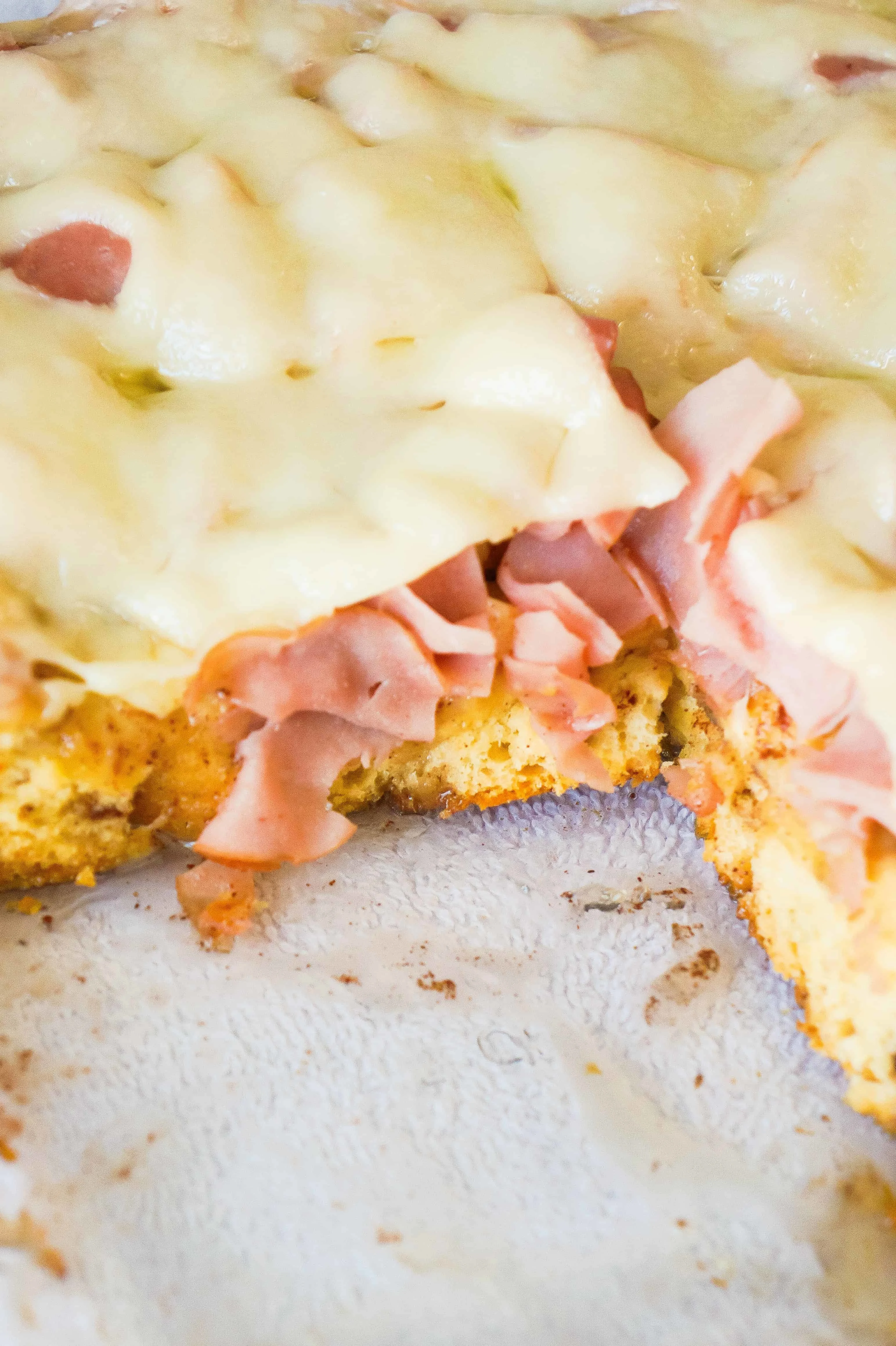 Monte Cristo Breakfast Casserole is loaded with cinnamon rolls, ham and Swiss cheese.