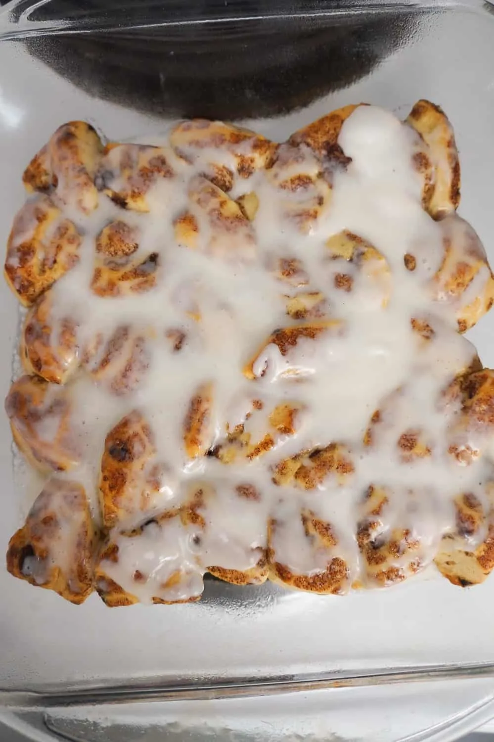 baked cinnamon bun pieces with icing