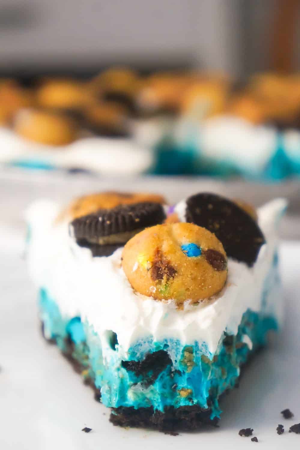 No Bake Cookie Monster Pie is an easy dessert recipe your kids will love. This colourful pie is made with instant pudding and Cool Whip in an Oreo crust and loaded with a variety of mini cookies.