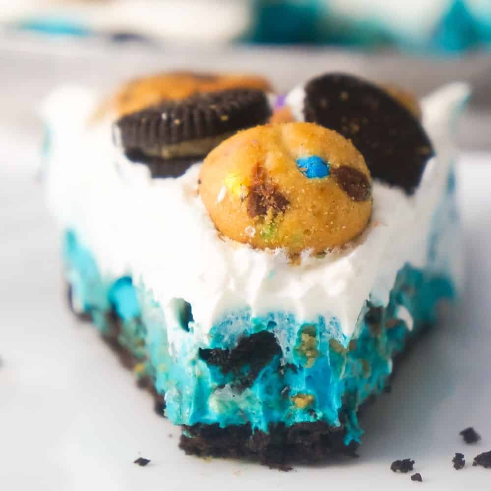 No Bake Cookie Monster Pie is an easy dessert recipe your kids will love. This colourful pie is made with instant pudding and Cool Whip in an Oreo crust and loaded with a variety of mini cookies.