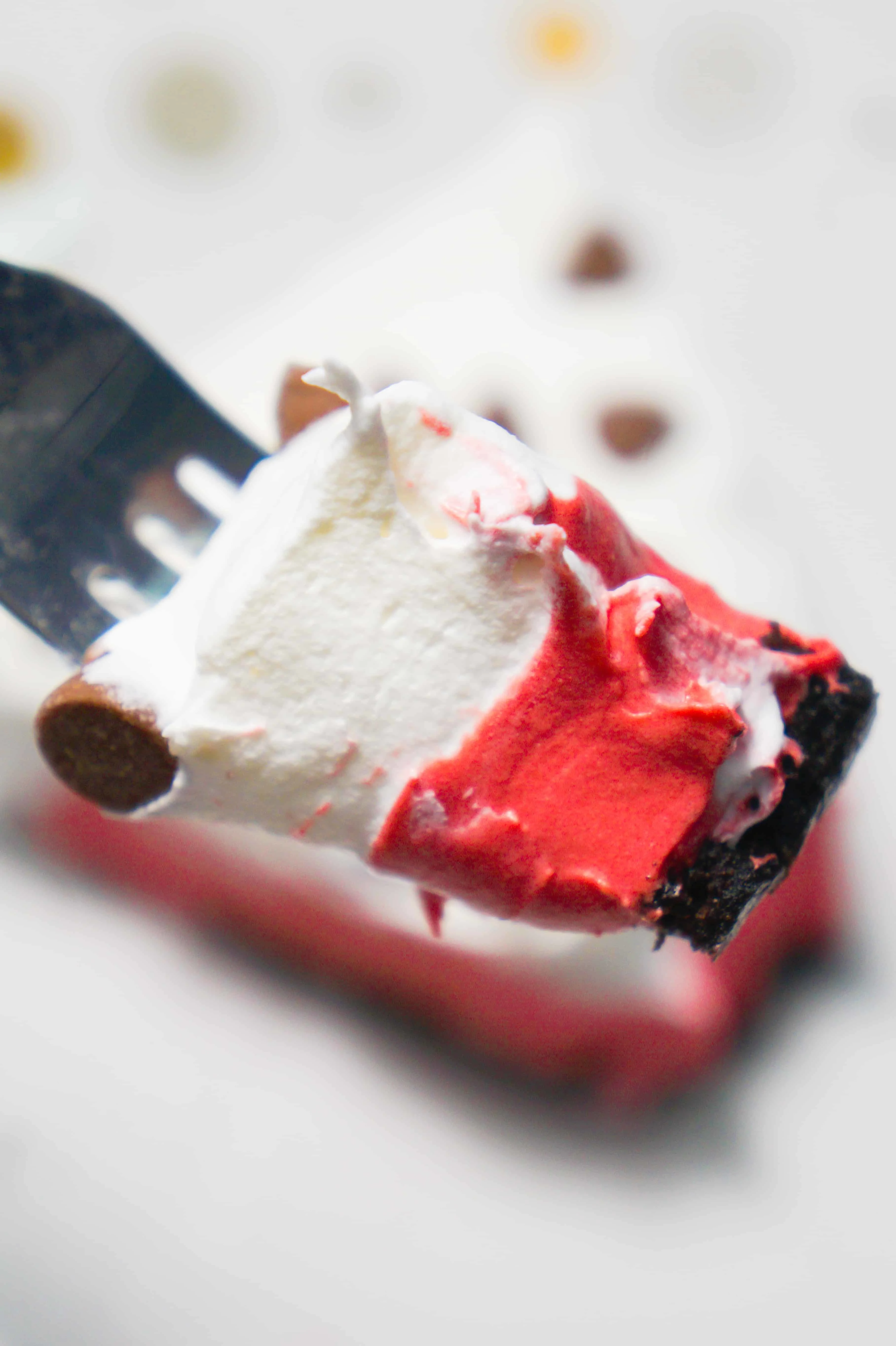 Bite of red velvet pudding pie.