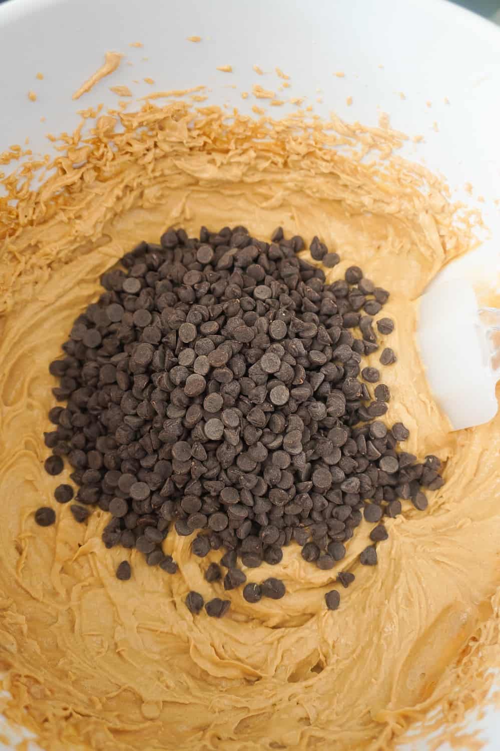 mini chocolate chips on top of peanut butter cookie dough dip