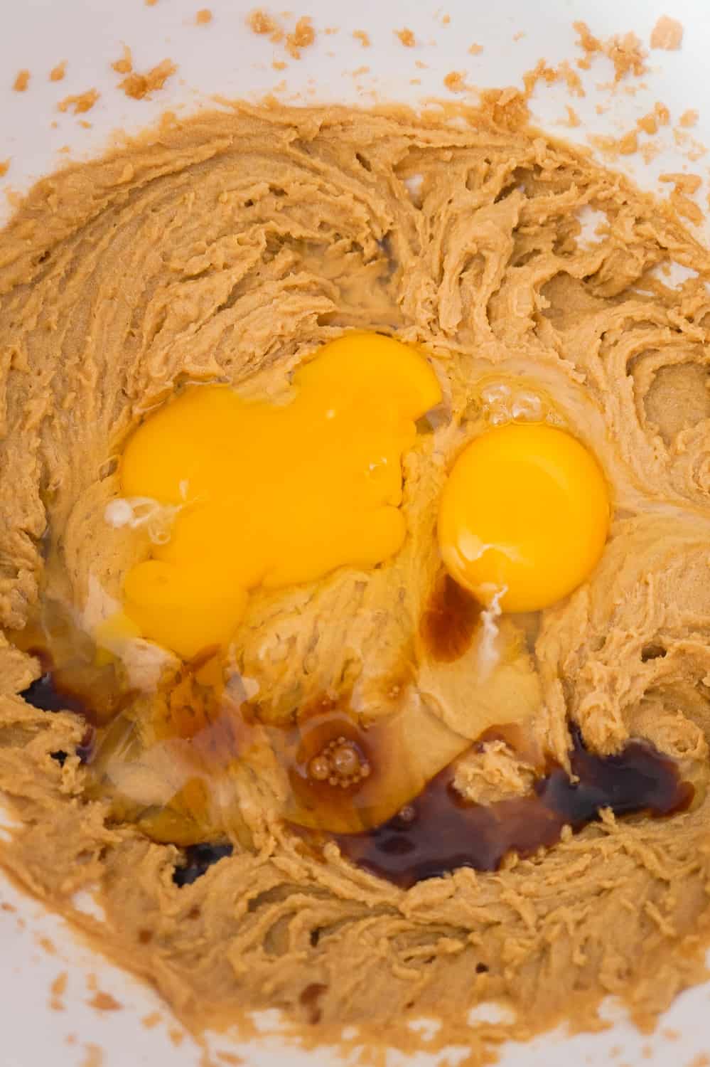 eggs and vanilla extract added to peanut butter mixture