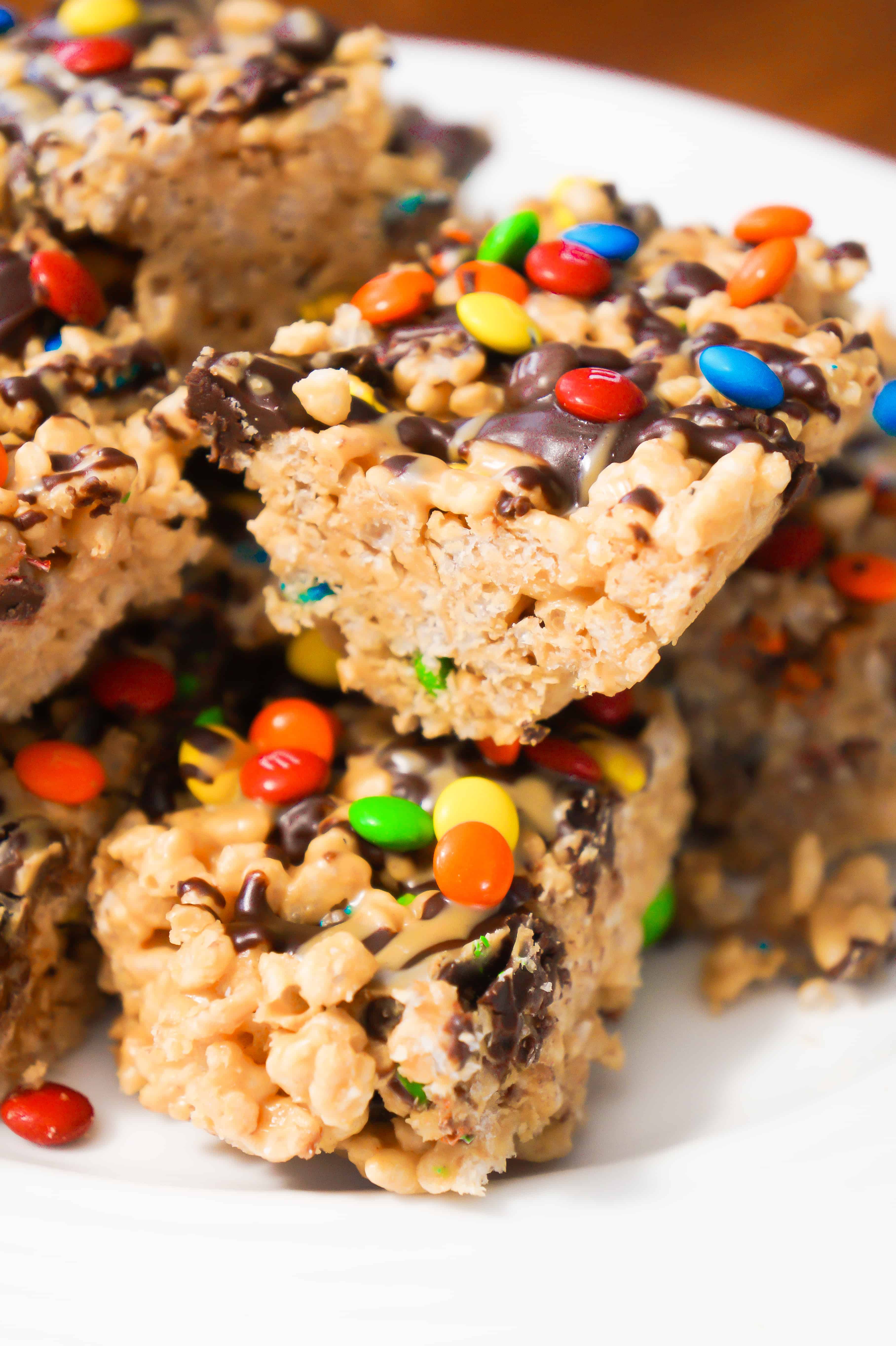 Peanut Butter Rice Krispie Treats. Easy chocolate peanut butter dessert recipe. Rice Krispie squares loaded with M&Ms.