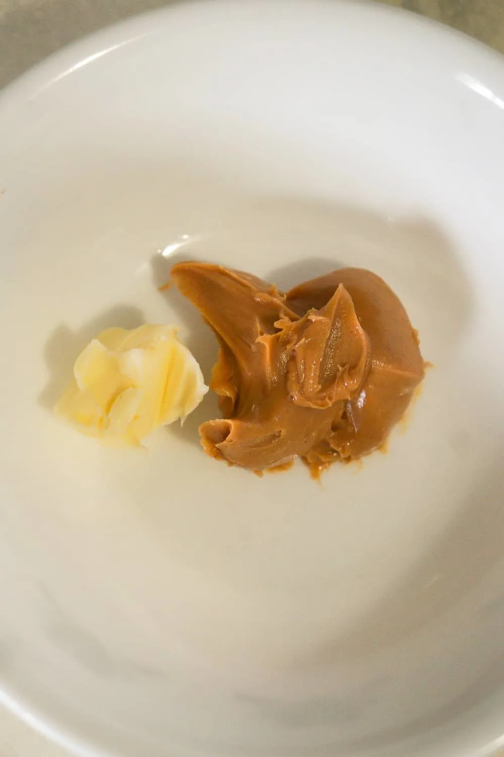 peanut butter and butter in a small bowl