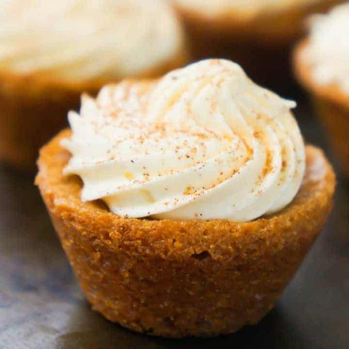 Bite size pumpkin spice blondies with cream cheese frosting. Perfect dessert for Thanksgiving and Halloween.