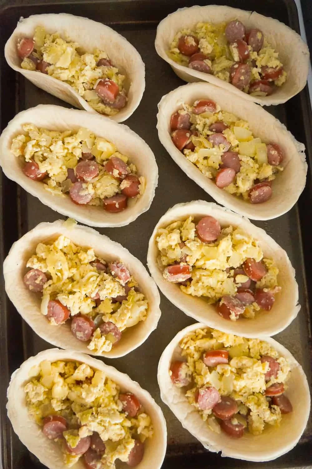 egg and sausage in tortilla bowls