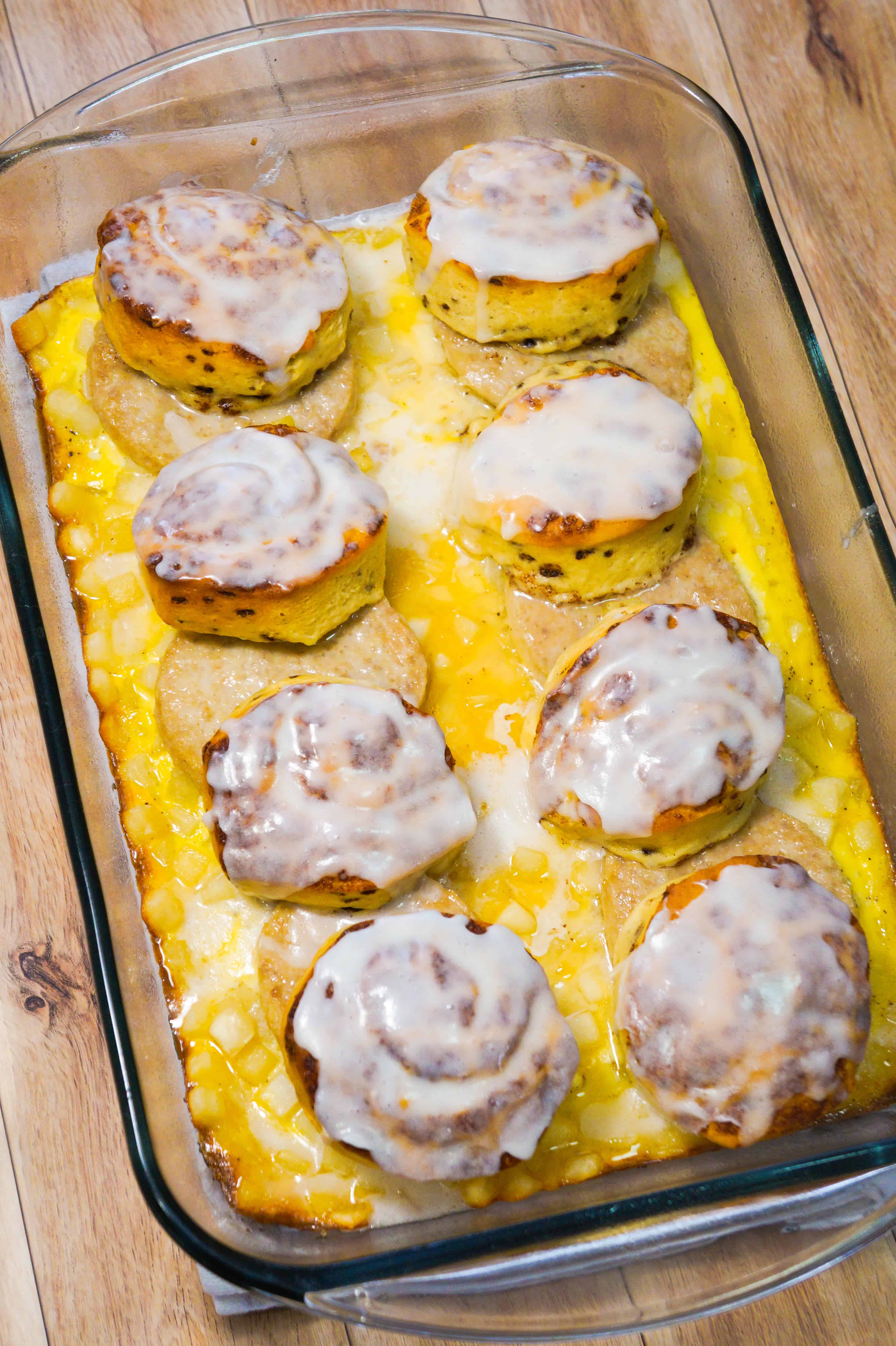 Sausage and egg breakfast casserole topped with Pillsbury cinnamon rolls is and easy breakfast recipe.