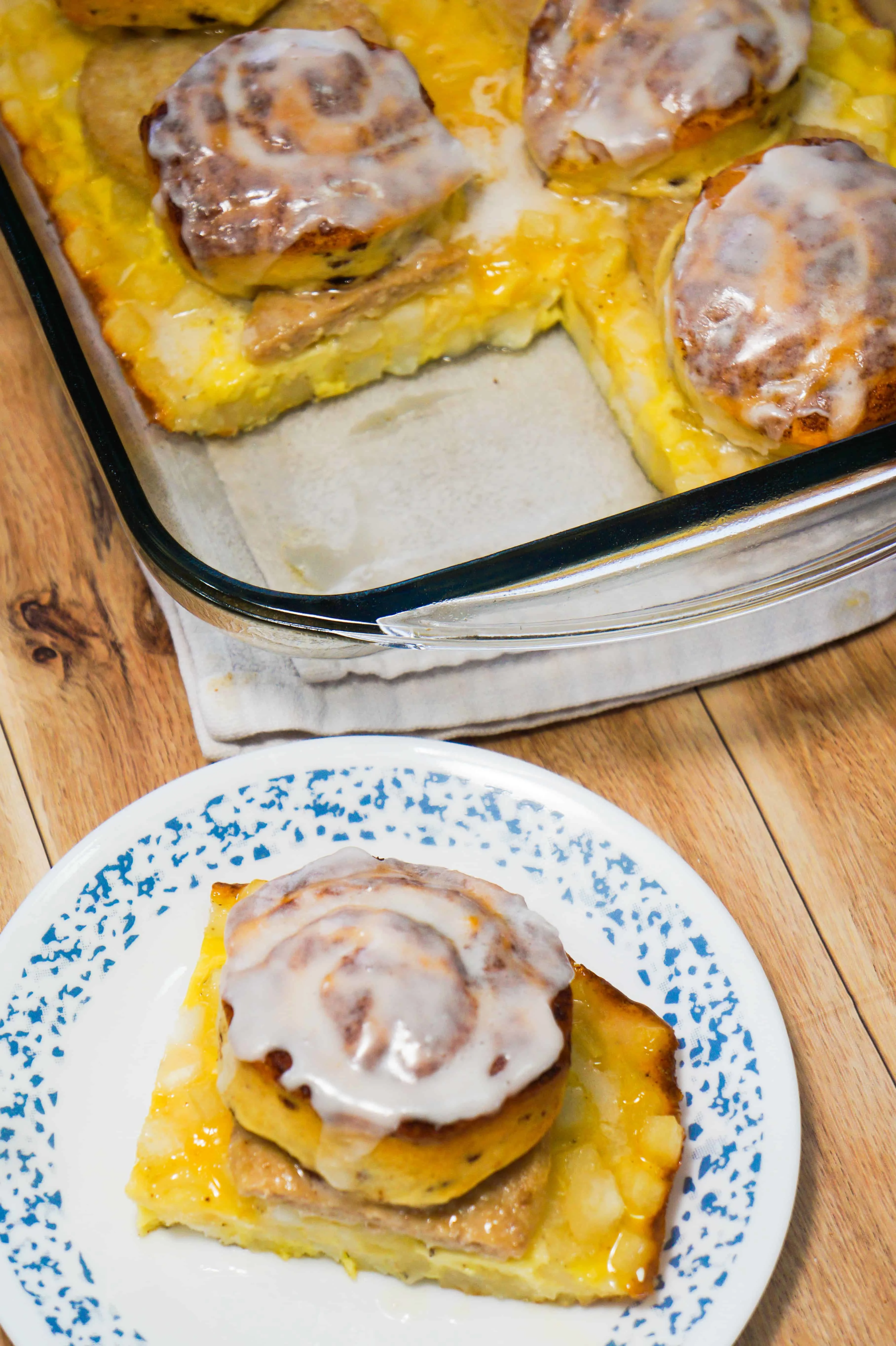Cinnamon roll breakfast casserole recipe loaded with hash browns, eggs and sausage.