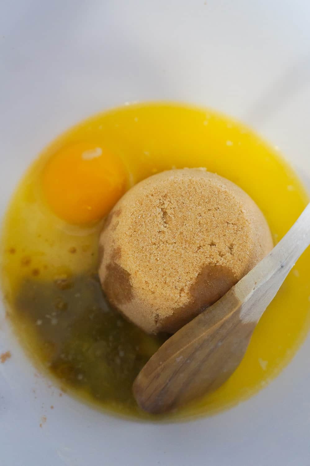brown sugar, melted butter and egg in a mixing bowl