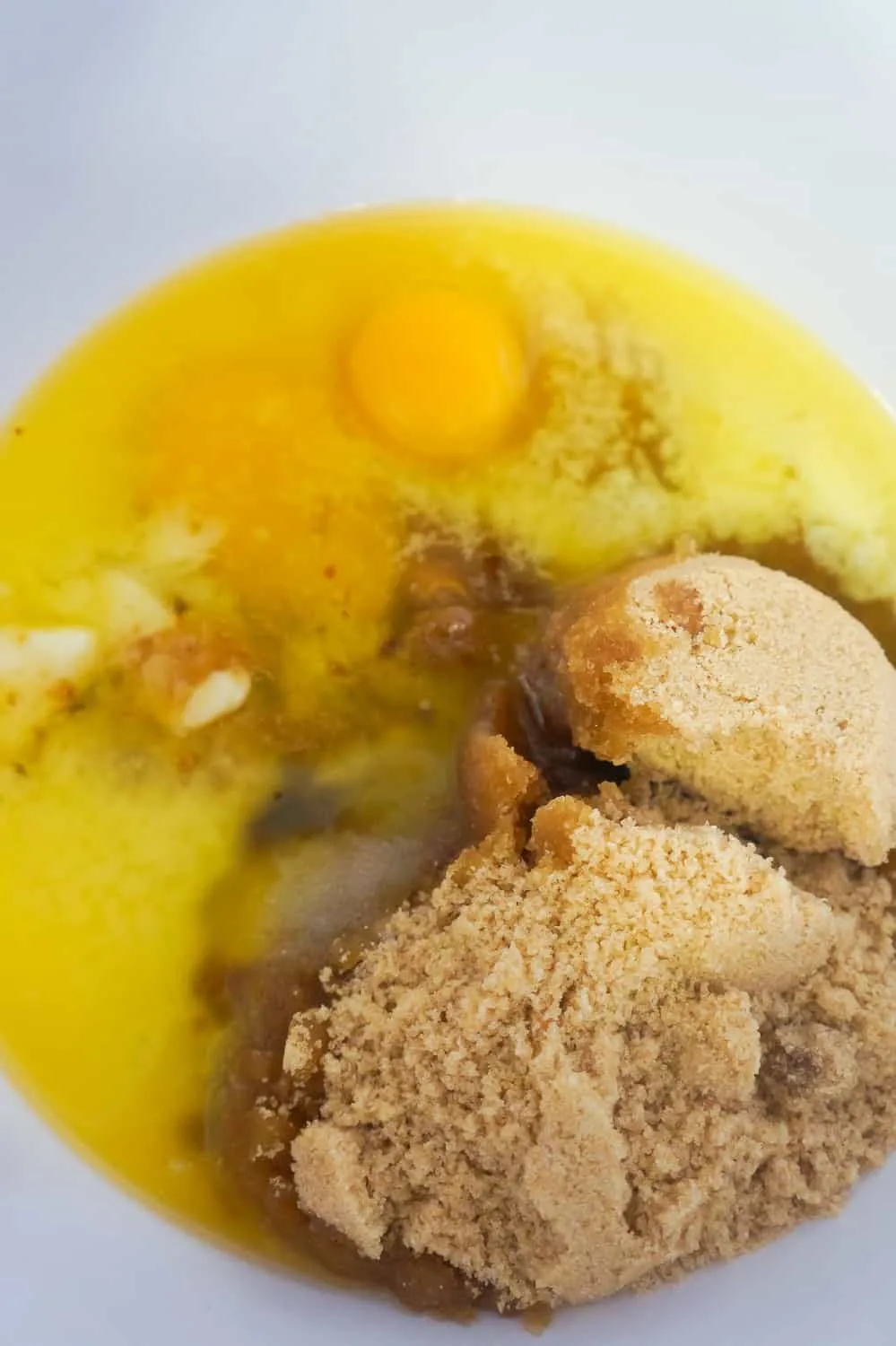 eggs, melted butter and brown sugar in a mixing bowl