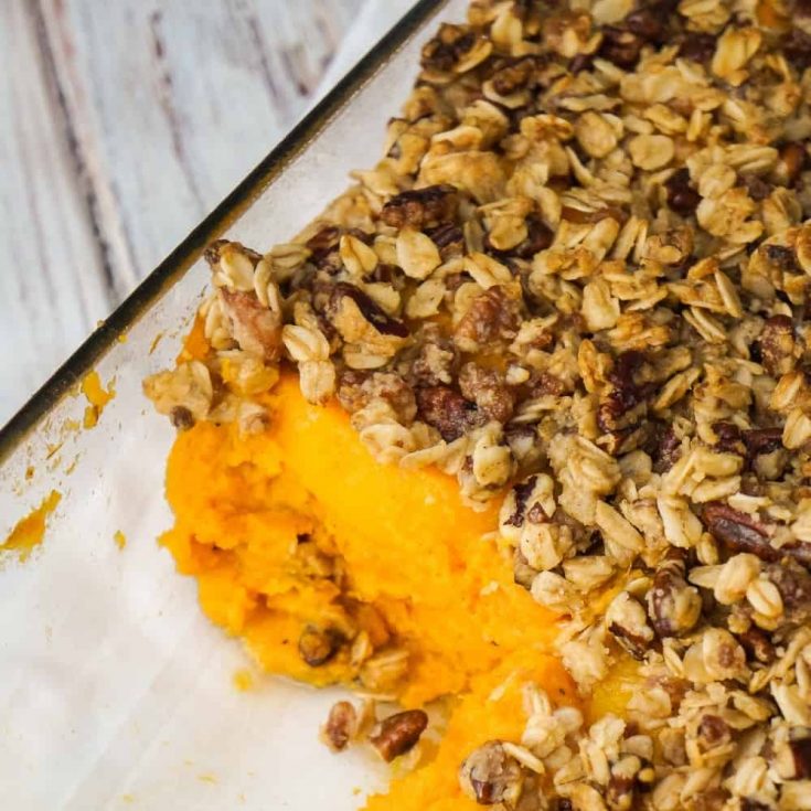 Sweet Potato Casserole with Peaches, Pecans & Bacon is the perfect side dish for a holiday dinner. Creamy mashed sweet potatoes are topped with sliced peaches and an oat crumble with pecans and bacon.