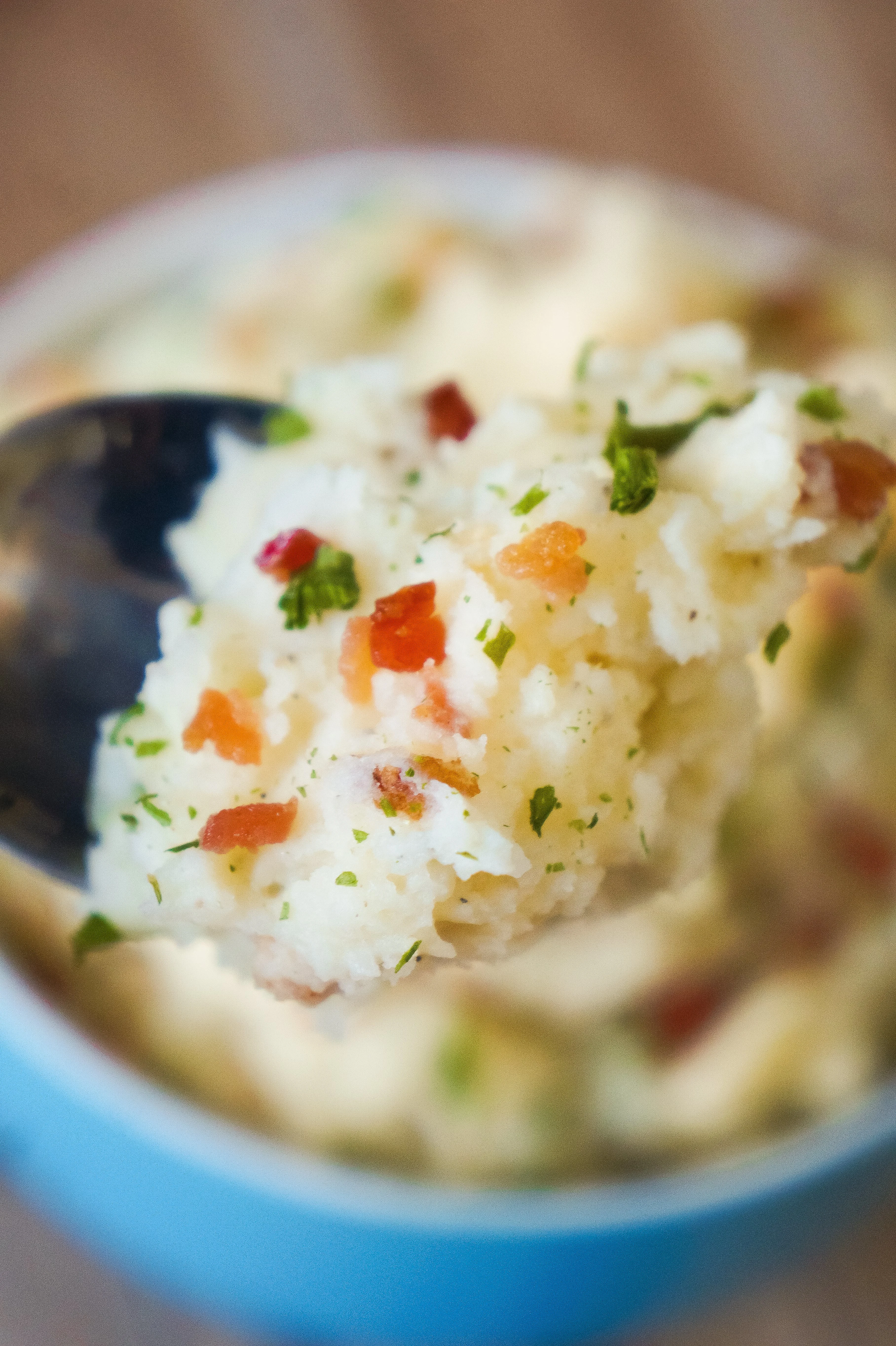Creamy Mashed Potatoes loaded with bacon and cream cheese with a hint of garlic.