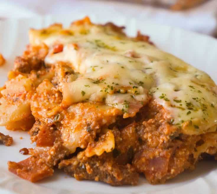 Three Meat Lasagna Casserole is an easy dinner recipe loaded with ground beef, pepperoni, bacon and cheese. This fun twist on lasagna requires no layering and only takes 45 minutes from start to finish.