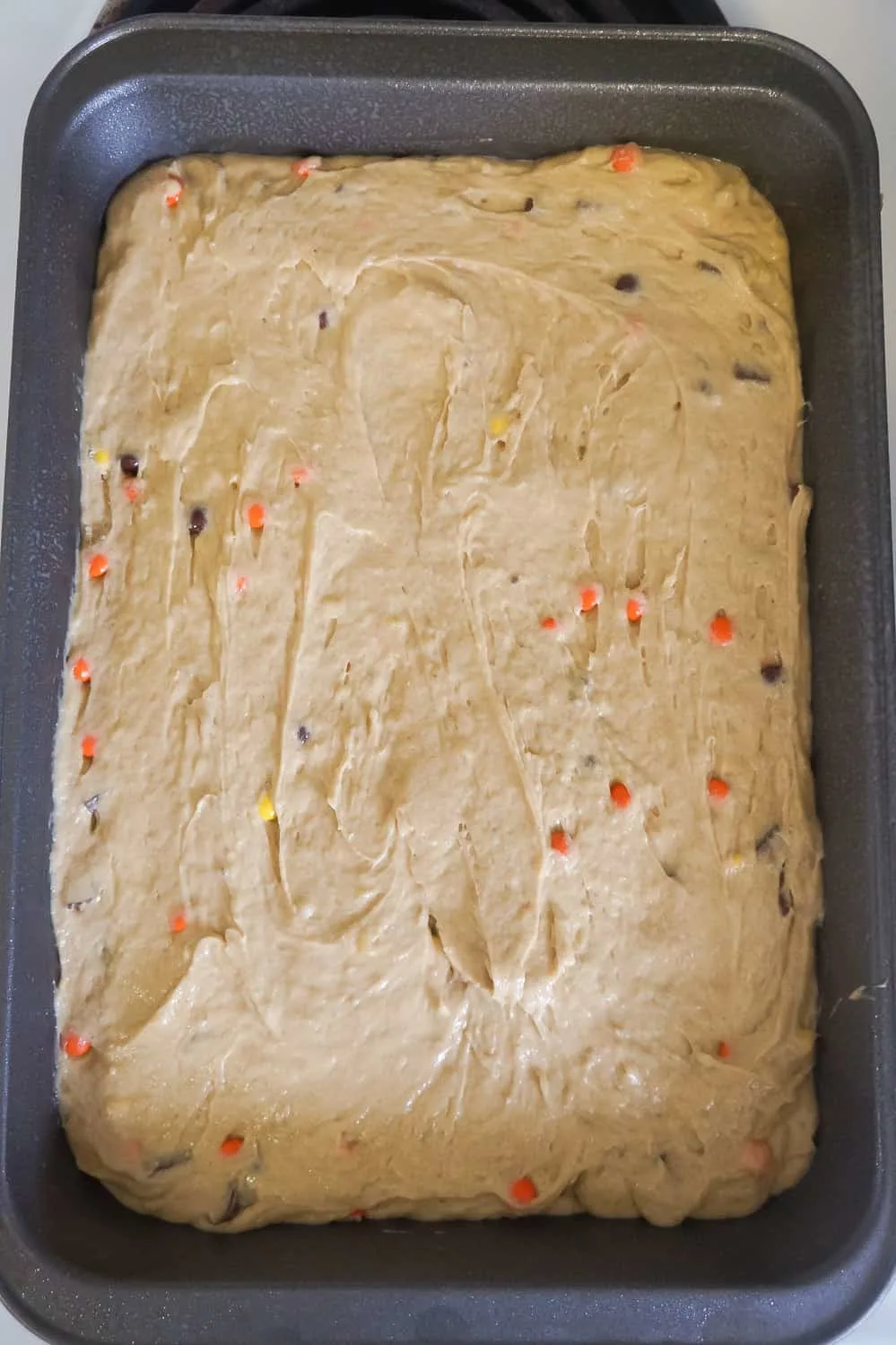 peanut butter banana cake batter in cake pan